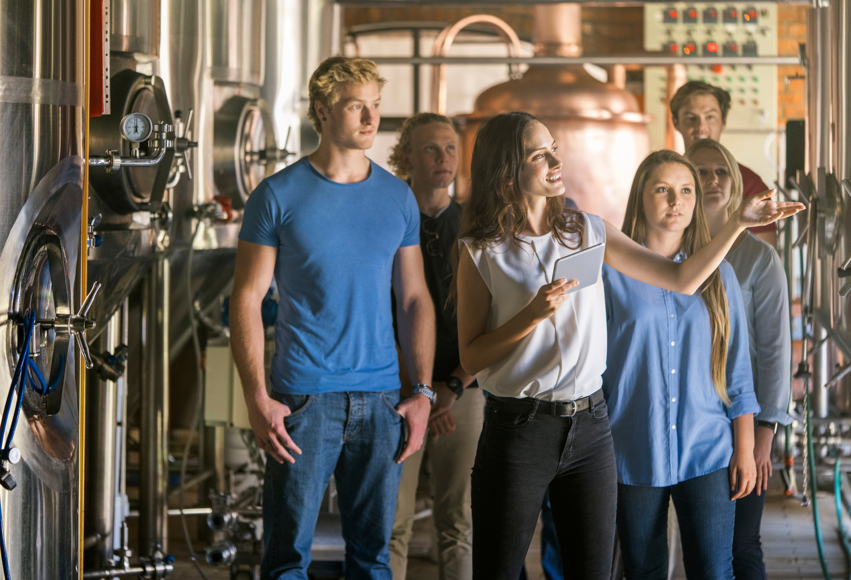 Supervisor and team visiting beer factory